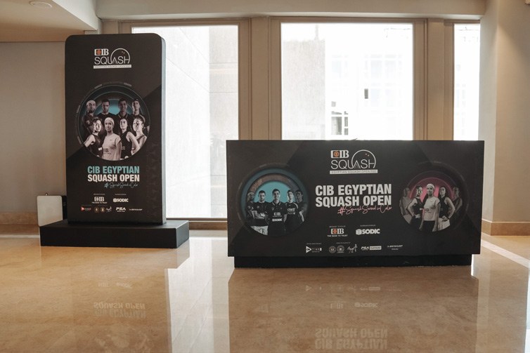 CIB Squash Open · lobby branding